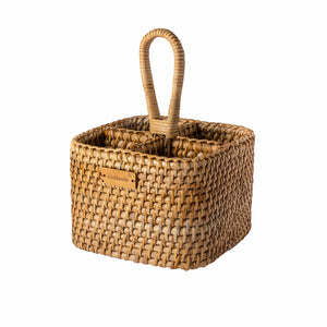 Woven basket with handle on a white background