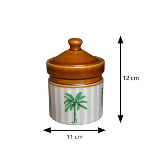 Ceramic jar with a lid featuring palm tree design, dimensions indicated.