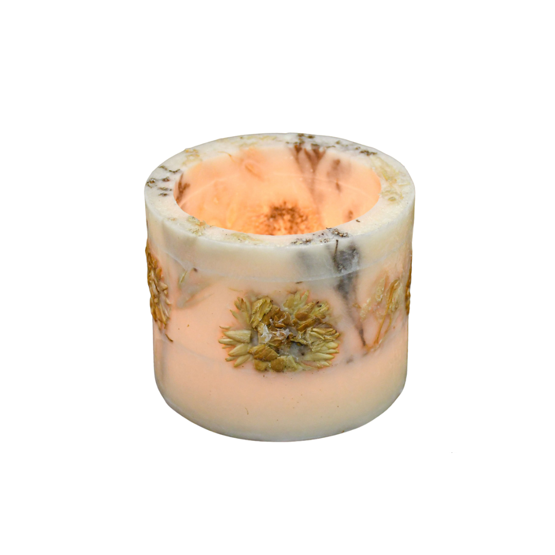 The votive holder glows when a tealight is placed inside