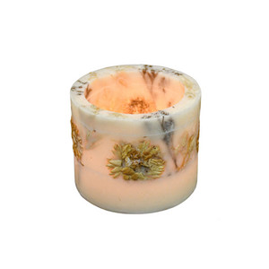 The votive holder glows when a tealight is placed inside