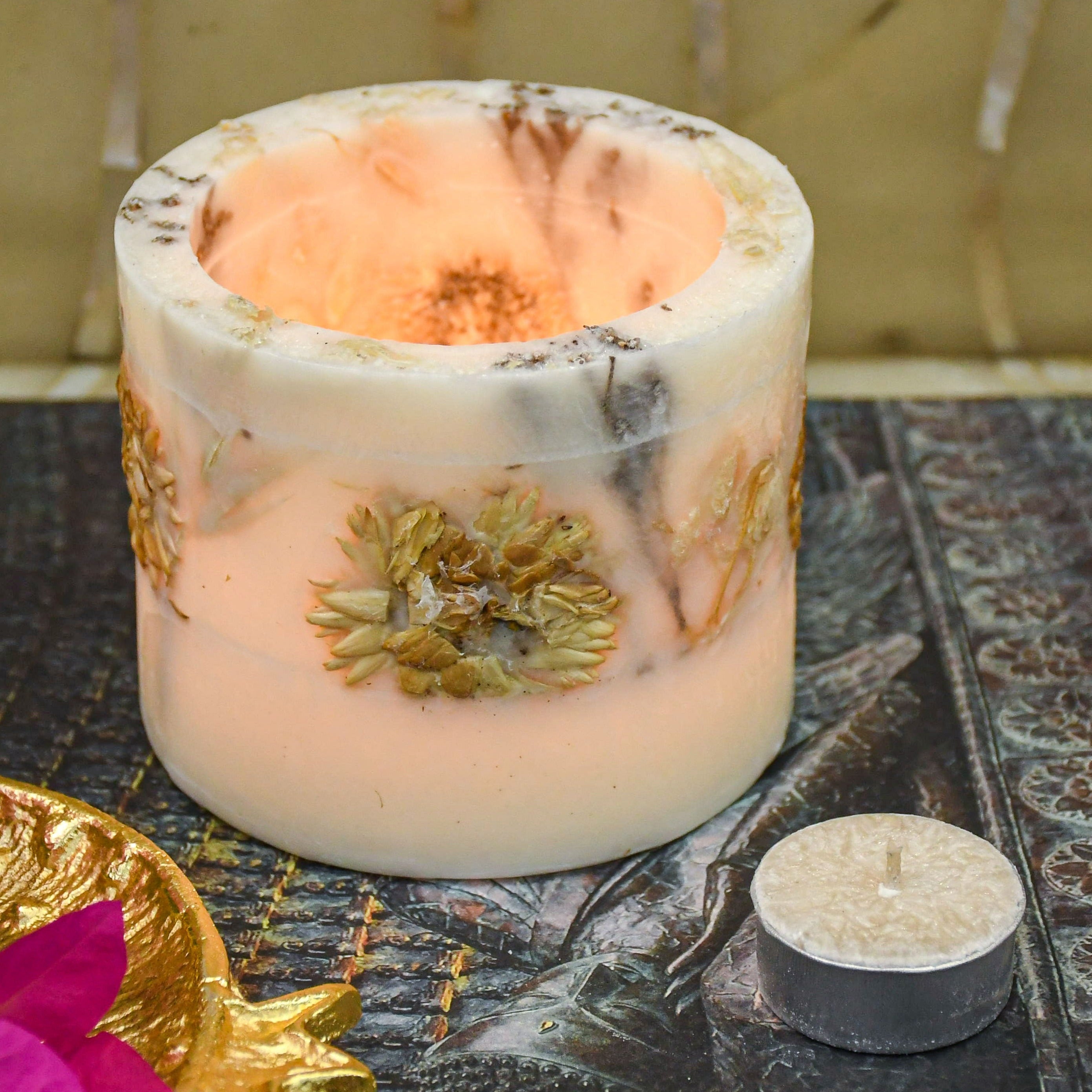 Wax votive holder with real flowers pressed inside