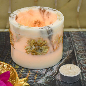 Wax votive holder with real flowers pressed inside