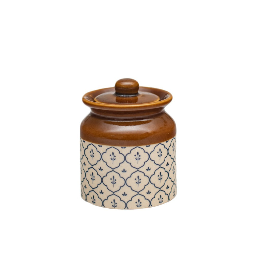 White ceramic jar with blue ogee pattern
